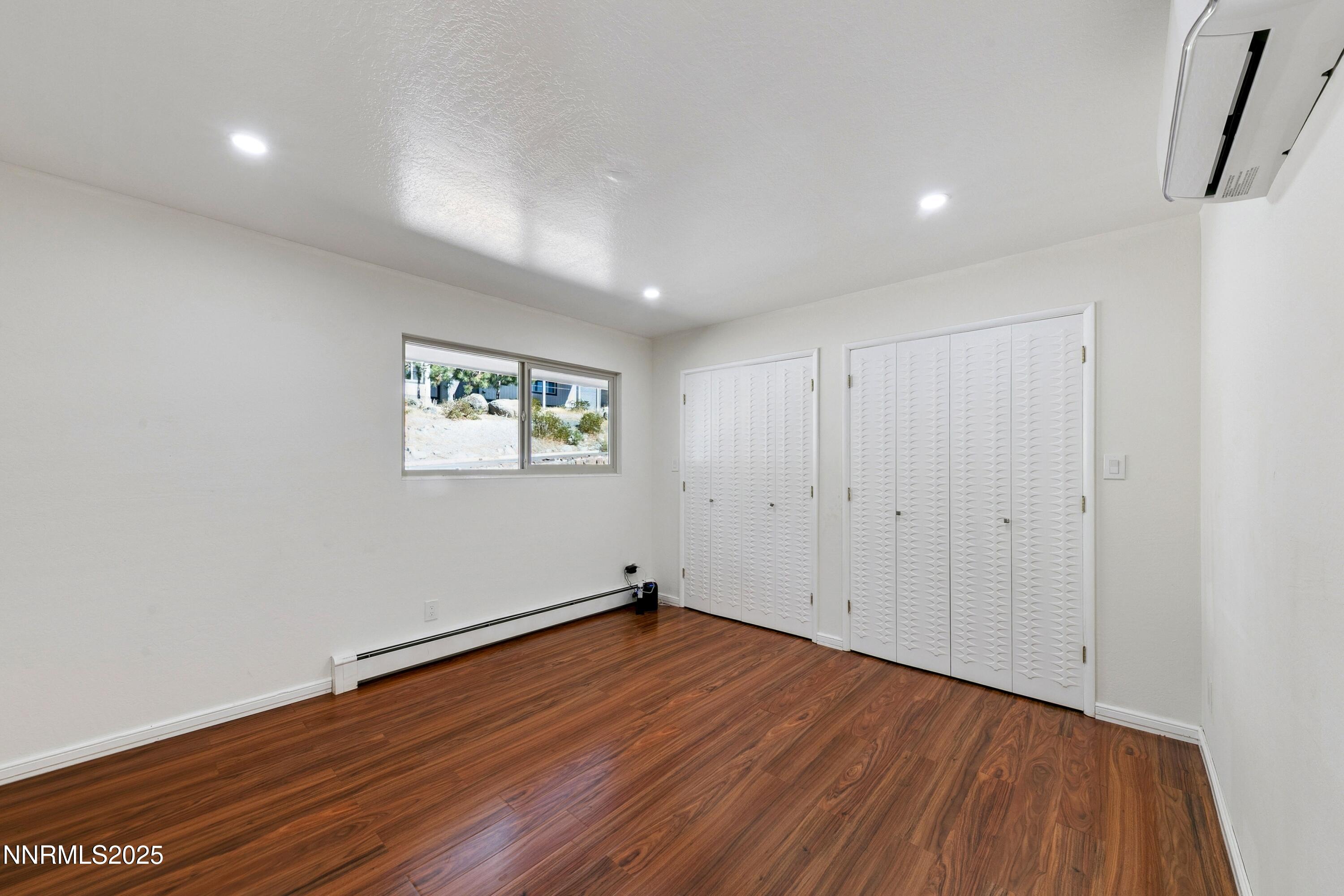 207 Cedar Ridge Drive Zephyr Cove, NV 89448 - Photo 10 of 26 a view of a big room with wooden floor and window