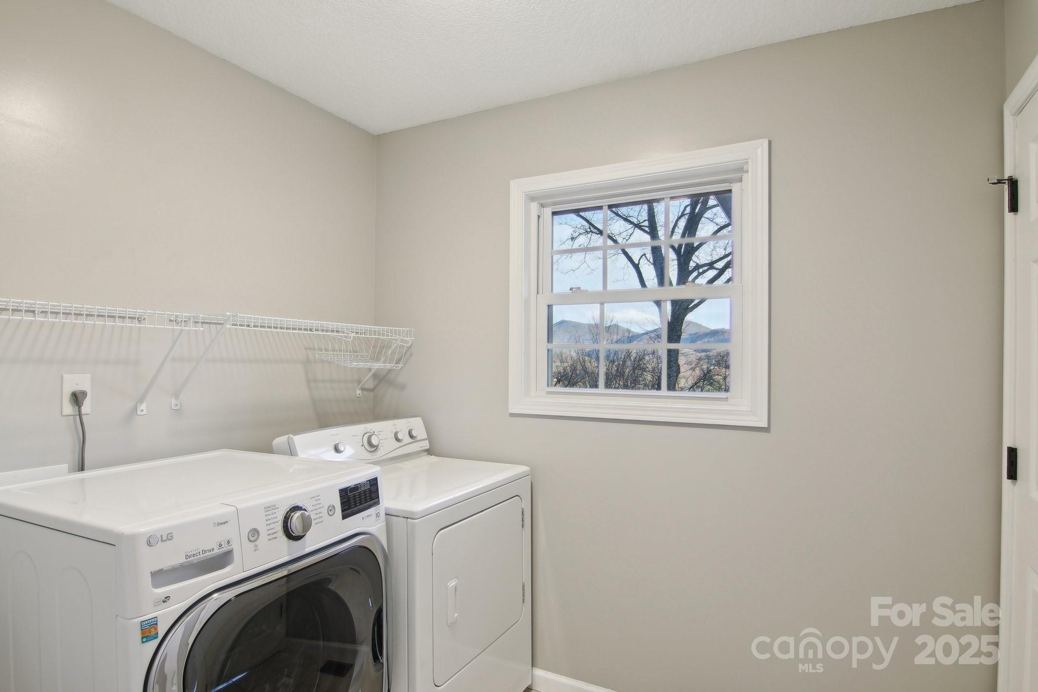 76 Eastern Sky Drive Canton, NC 28716 - Photo 23 of 48 a utility room with dryer and washer