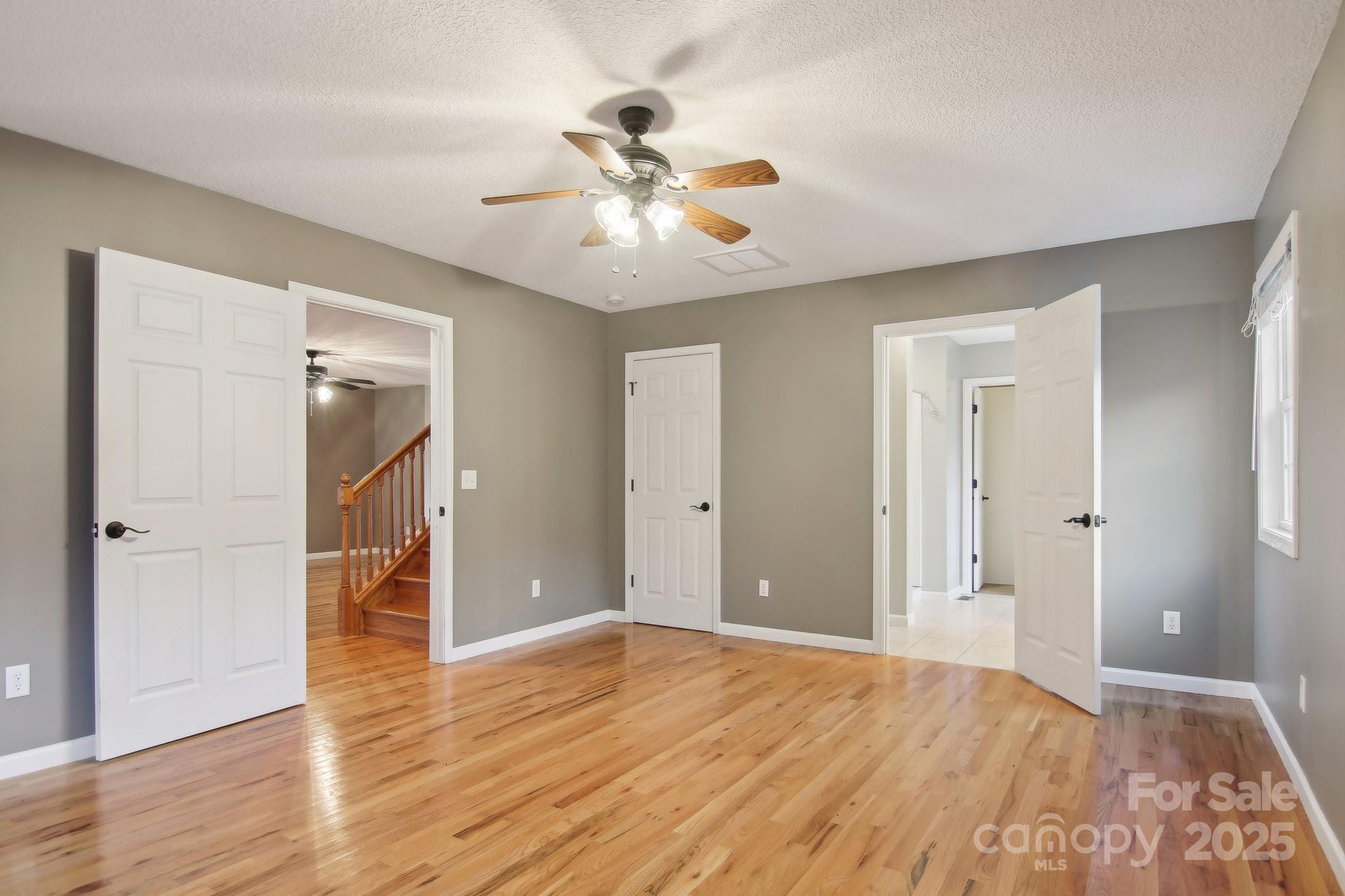 76 Eastern Sky Drive Canton, NC 28716 - Photo 27 of 48 a view of an empty room with wooden floor
