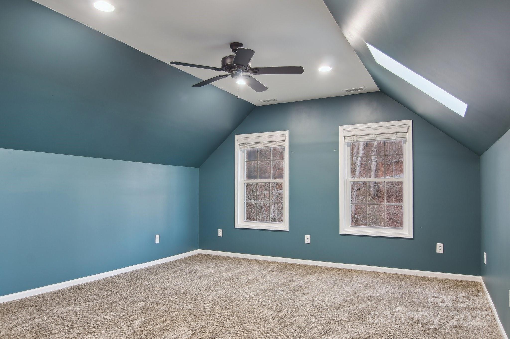 76 Eastern Sky Drive Canton, NC 28716 - Photo 36 of 48 a view of an empty room with a window