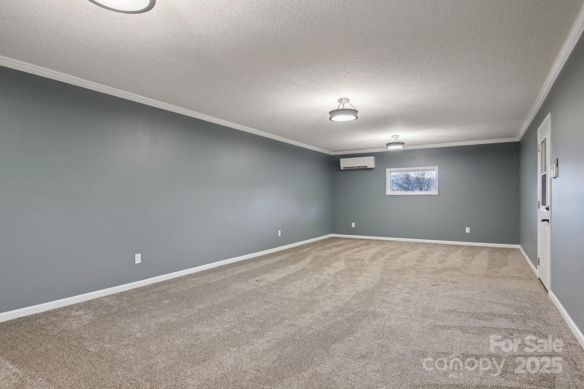 76 Eastern Sky Drive Canton, NC 28716 - Photo 38 of 48 an empty room with a empty space and windows