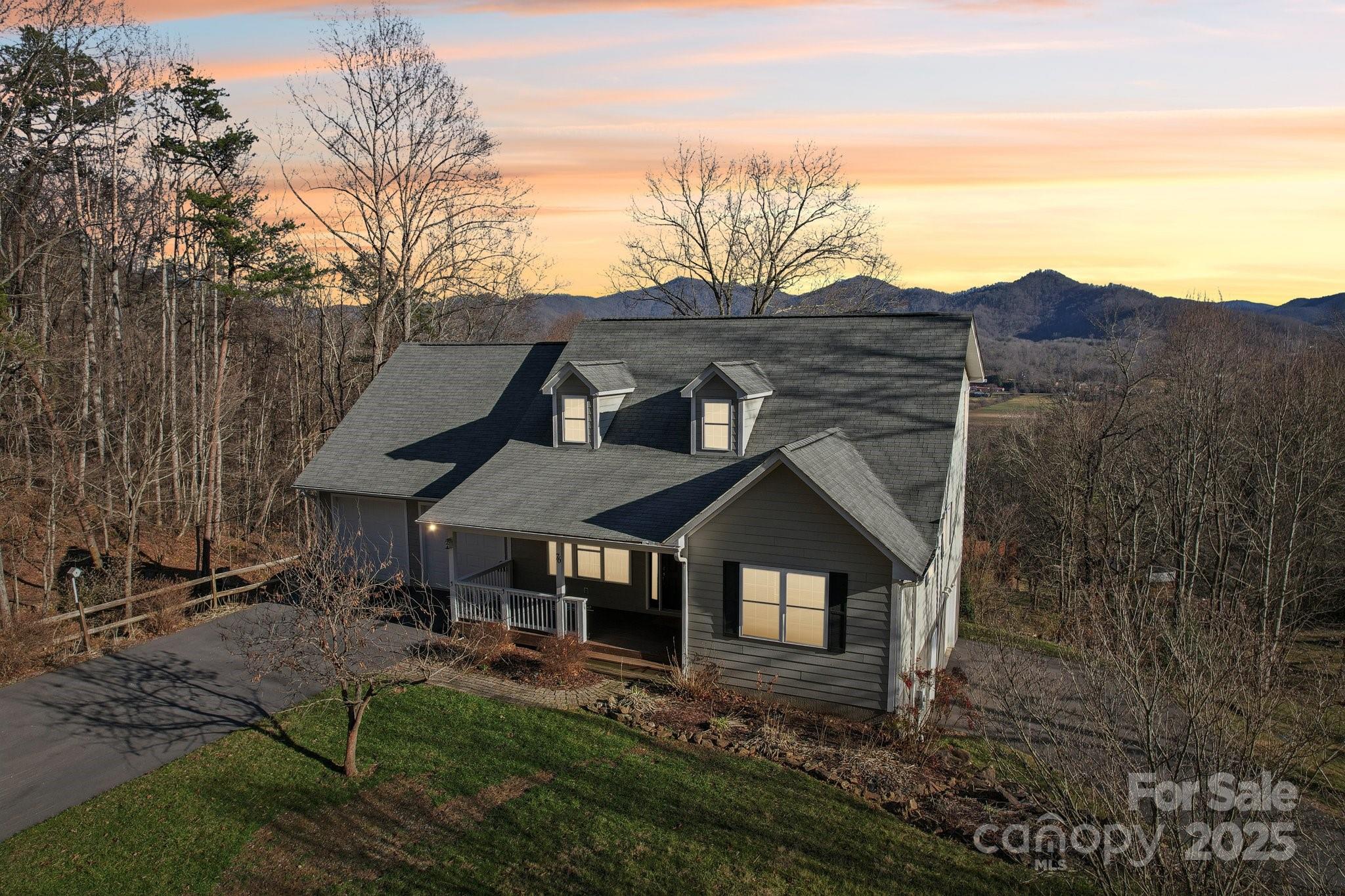 76 Eastern Sky Drive Canton, NC 28716 - Photo 44 of 48 a front view of a house with a yard