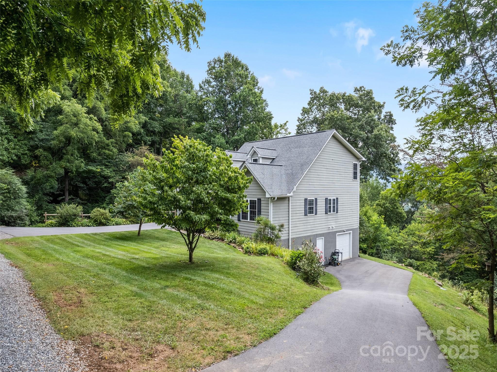 76 Eastern Sky Drive Canton, NC 28716 - Photo 46 of 48 a front view of a house with a yard