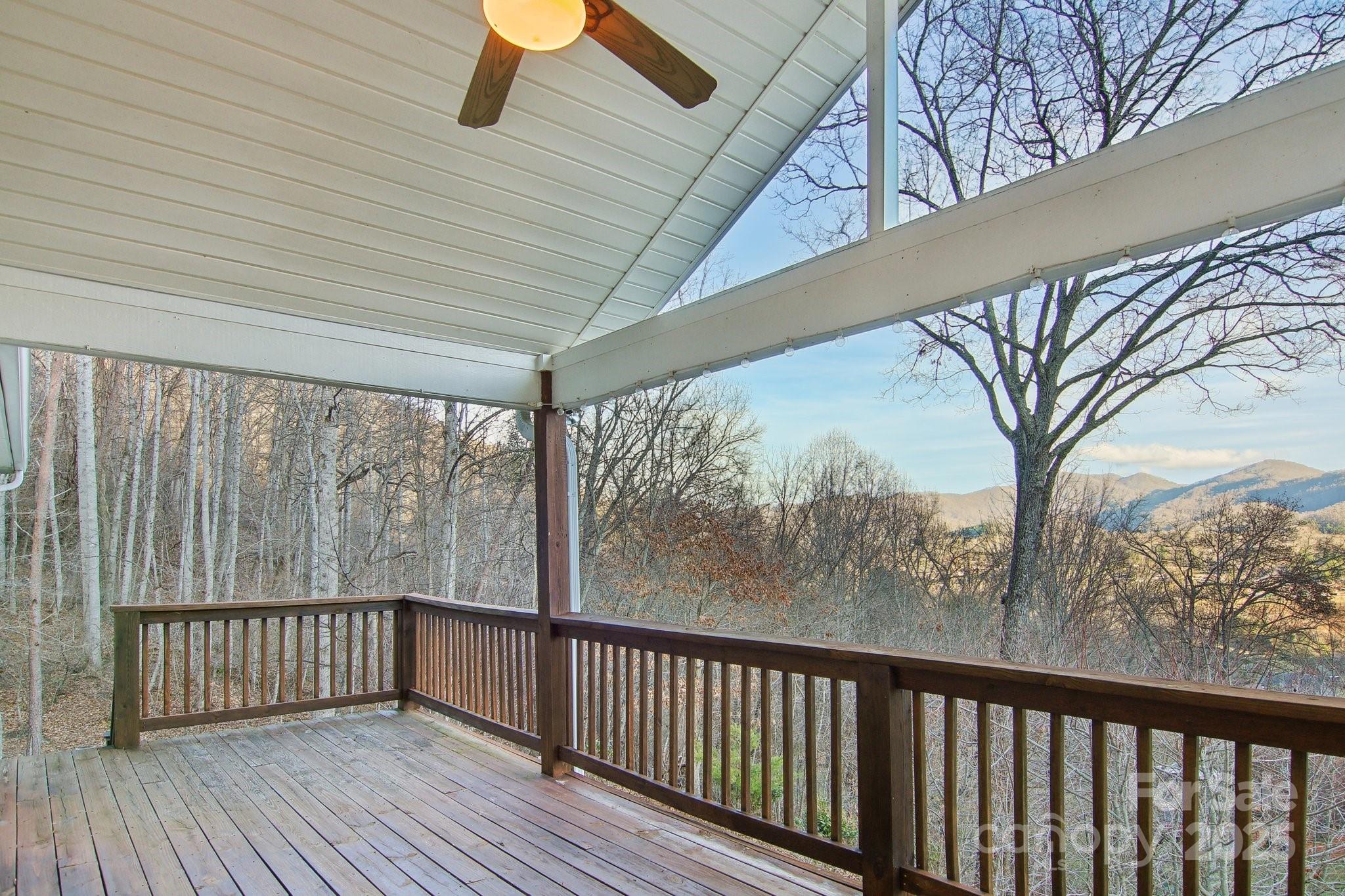 76 Eastern Sky Drive Canton, NC 28716 - Photo 8 of 48 a view of a wooden deck