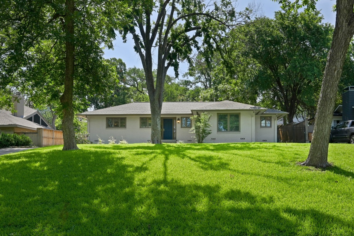2507 Hartford Road Austin, TX 78703 - Photo 1 of 1 a front view of a house with a garden