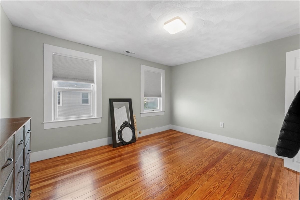 49 A Massasoit Avenue, Unit 2 Hull, MA 02045 - Photo 12 of 19 a view of a livingroom with wooden floor and a window