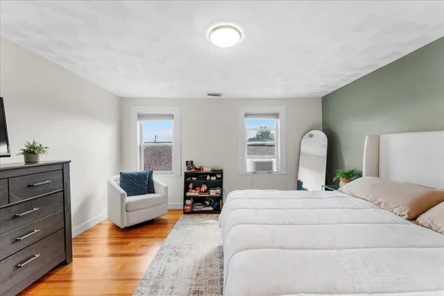 a bedroom with furniture and a couch