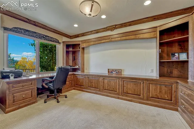 a view of a workspace with furniture