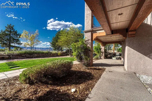 a view of a porch with a yard