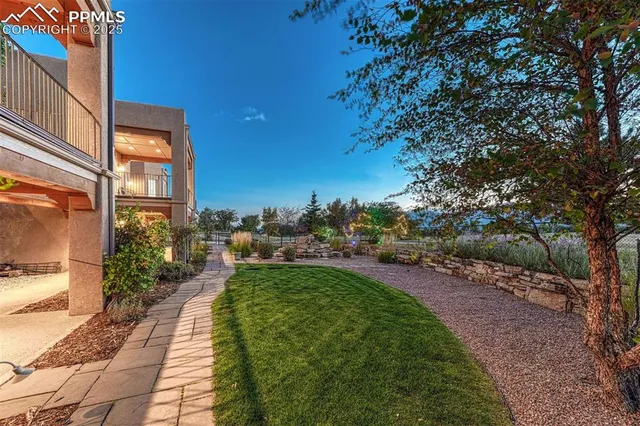 a view of a pathway with a yard