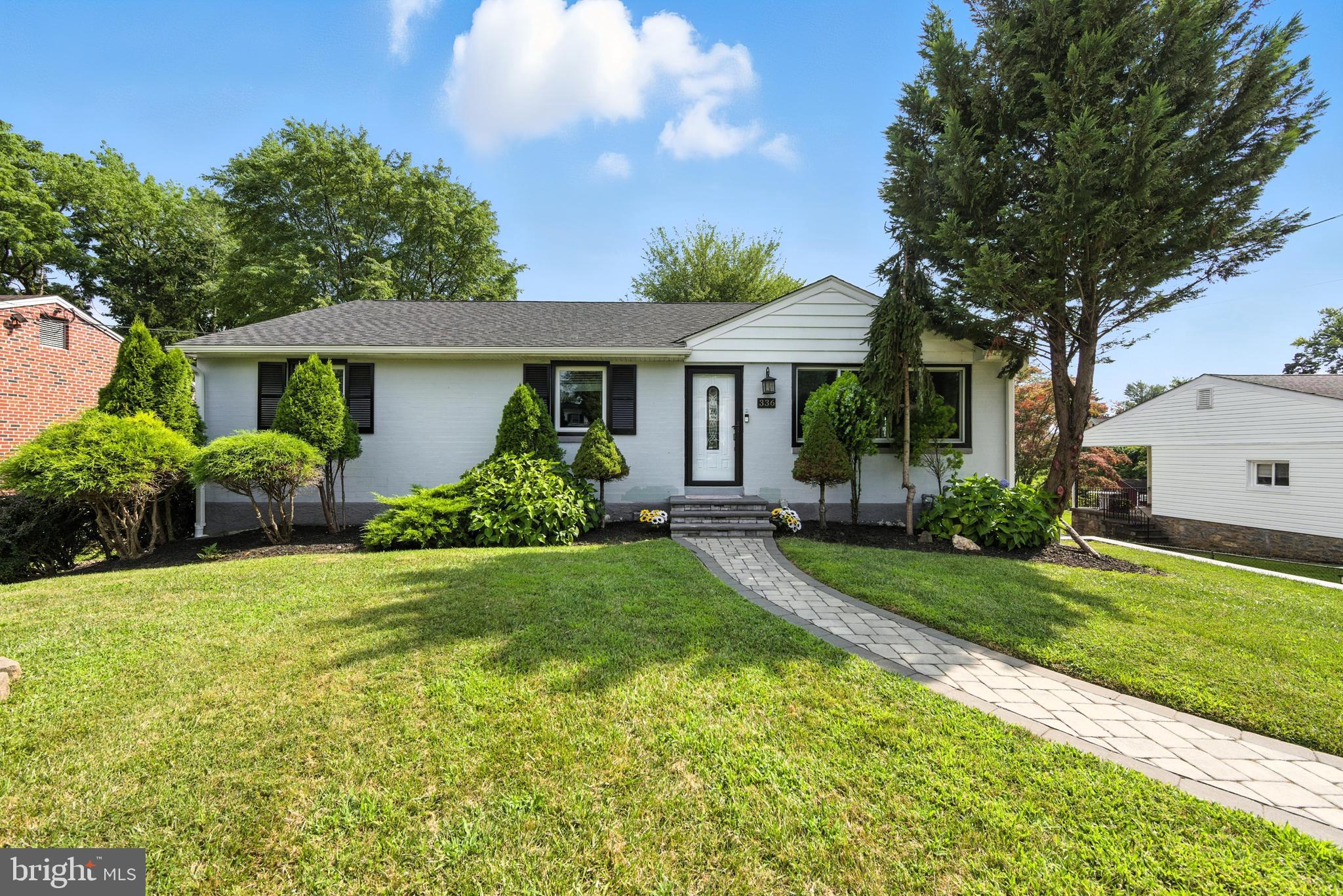 336 Kent Road Springfield, PA 19064 - Photo 1 of 36 a front view of house with yard and green space