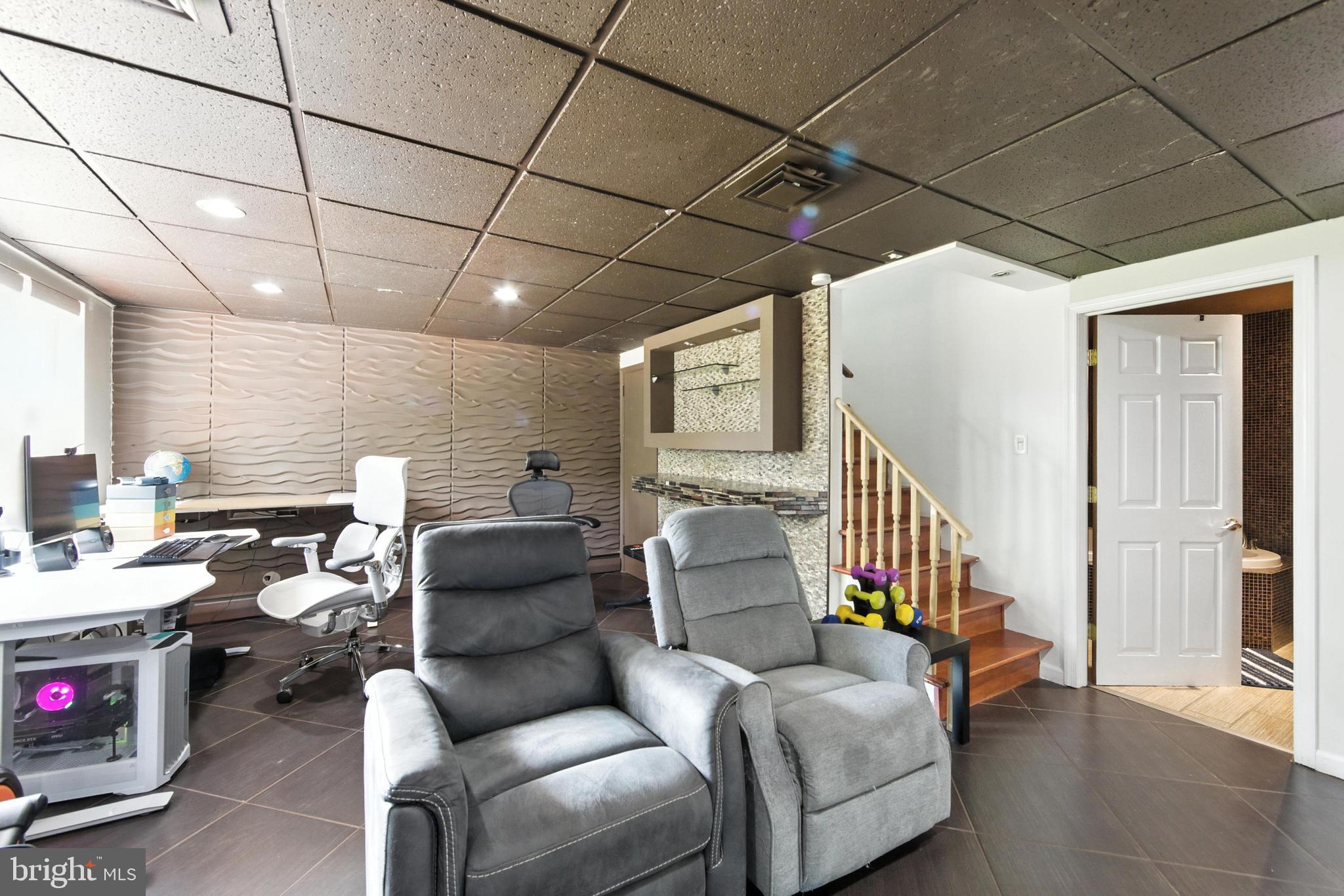336 Kent Road Springfield, PA 19064 - Photo 16 of 36 a living room with furniture and a wooden floor