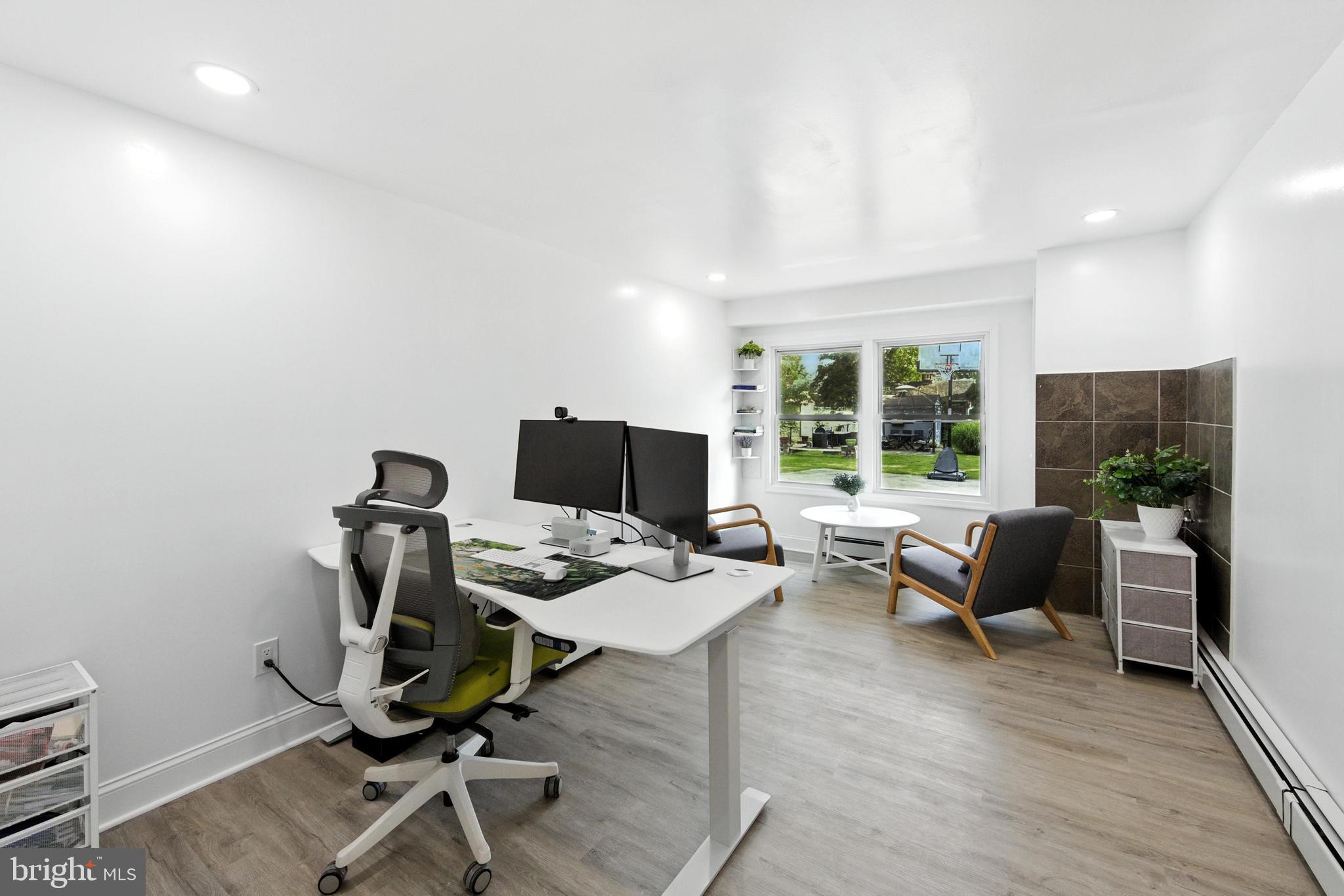 336 Kent Road Springfield, PA 19064 - Photo 19 of 36 a workspace with furniture and a window