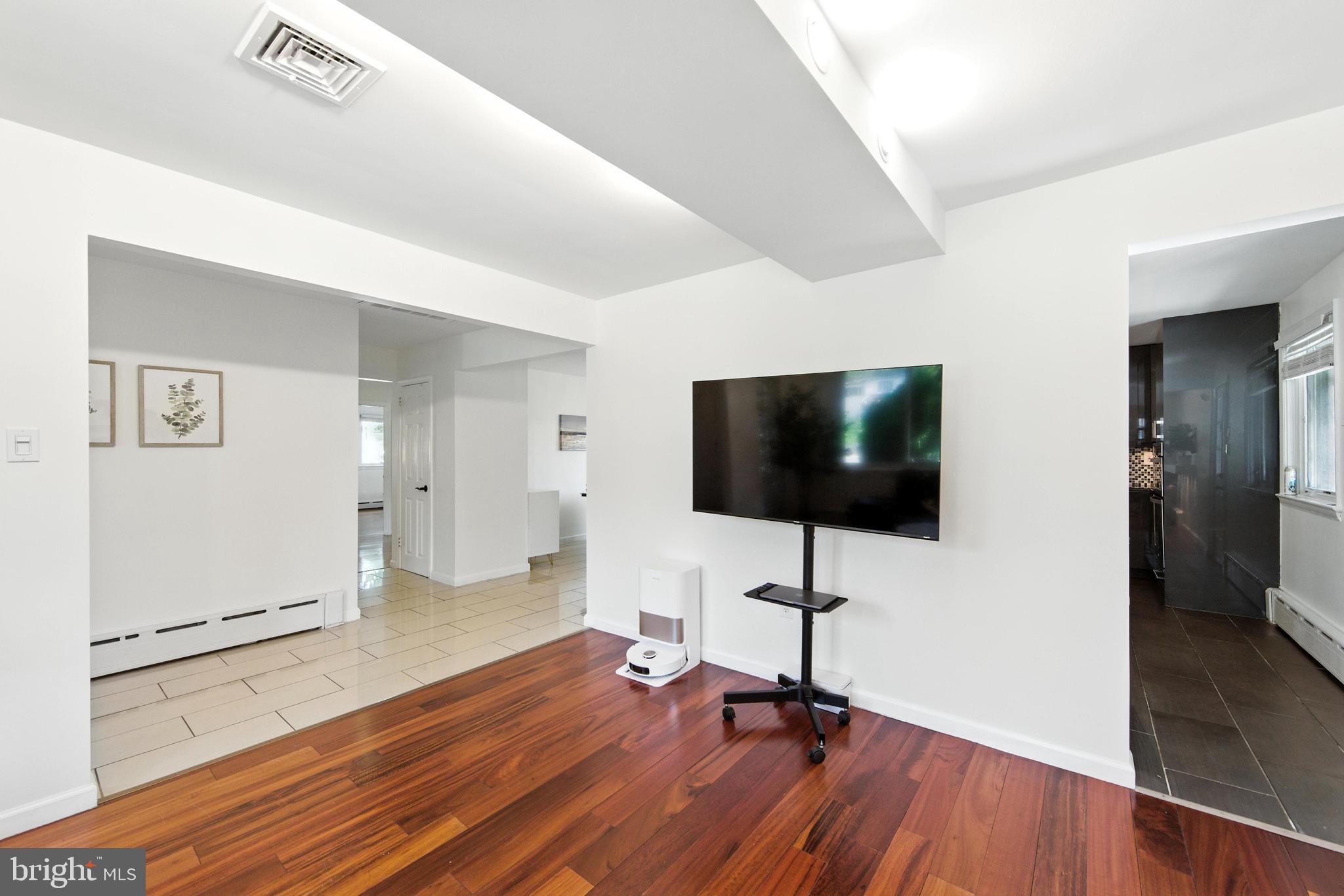 336 Kent Road Springfield, PA 19064 - Photo 23 of 36 a view of a livingroom with a flat screen tv