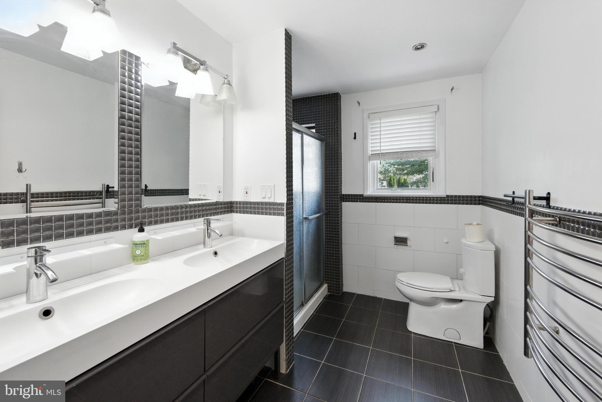 336 Kent Road Springfield, PA 19064 - Photo 35 of 36 a bathroom with a sink toilet and shower