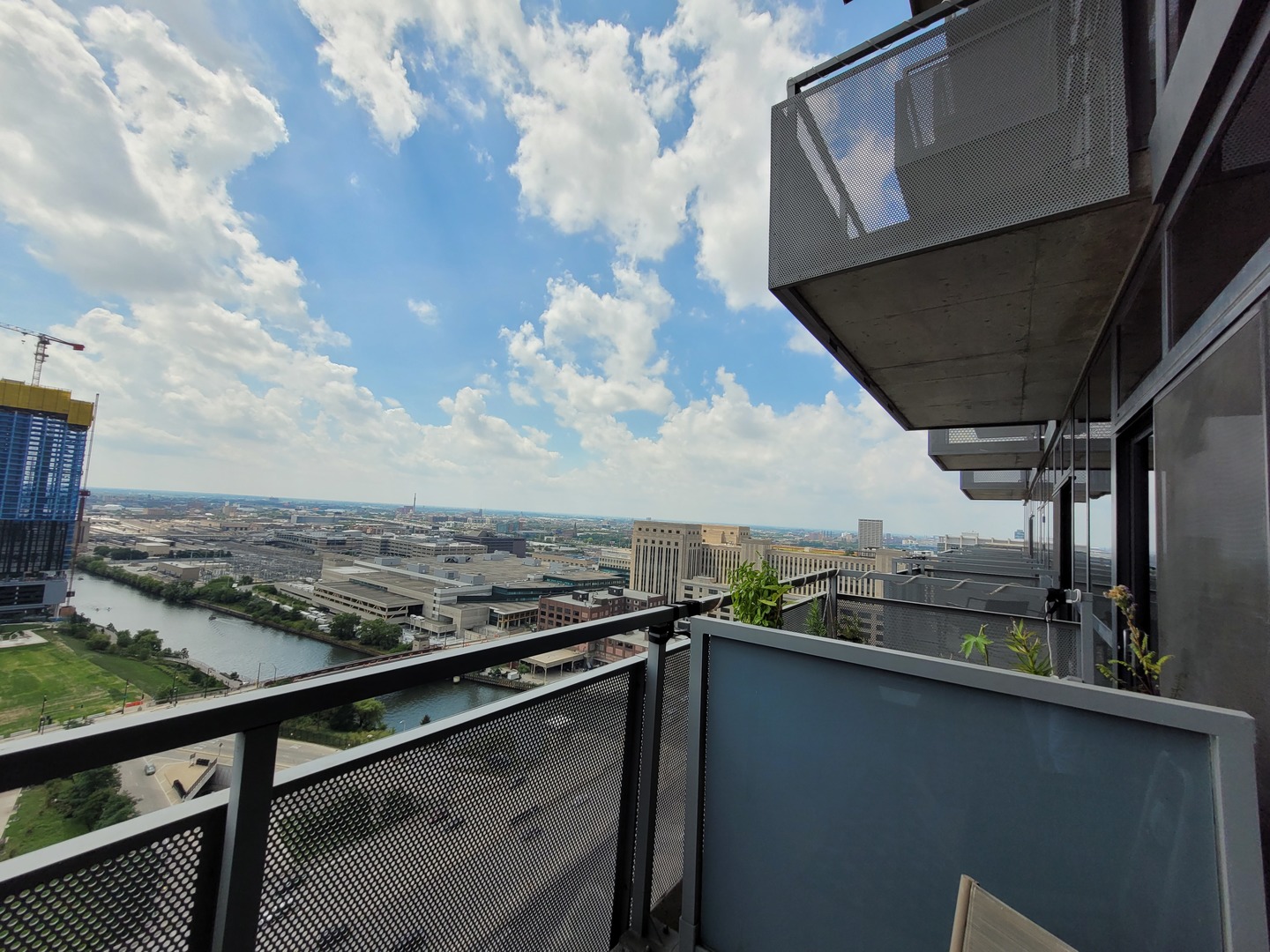235 West Van Buren Street, Unit 2608 Chicago, IL 60607 - Photo 17 of 20 a view of a city from a balcony
