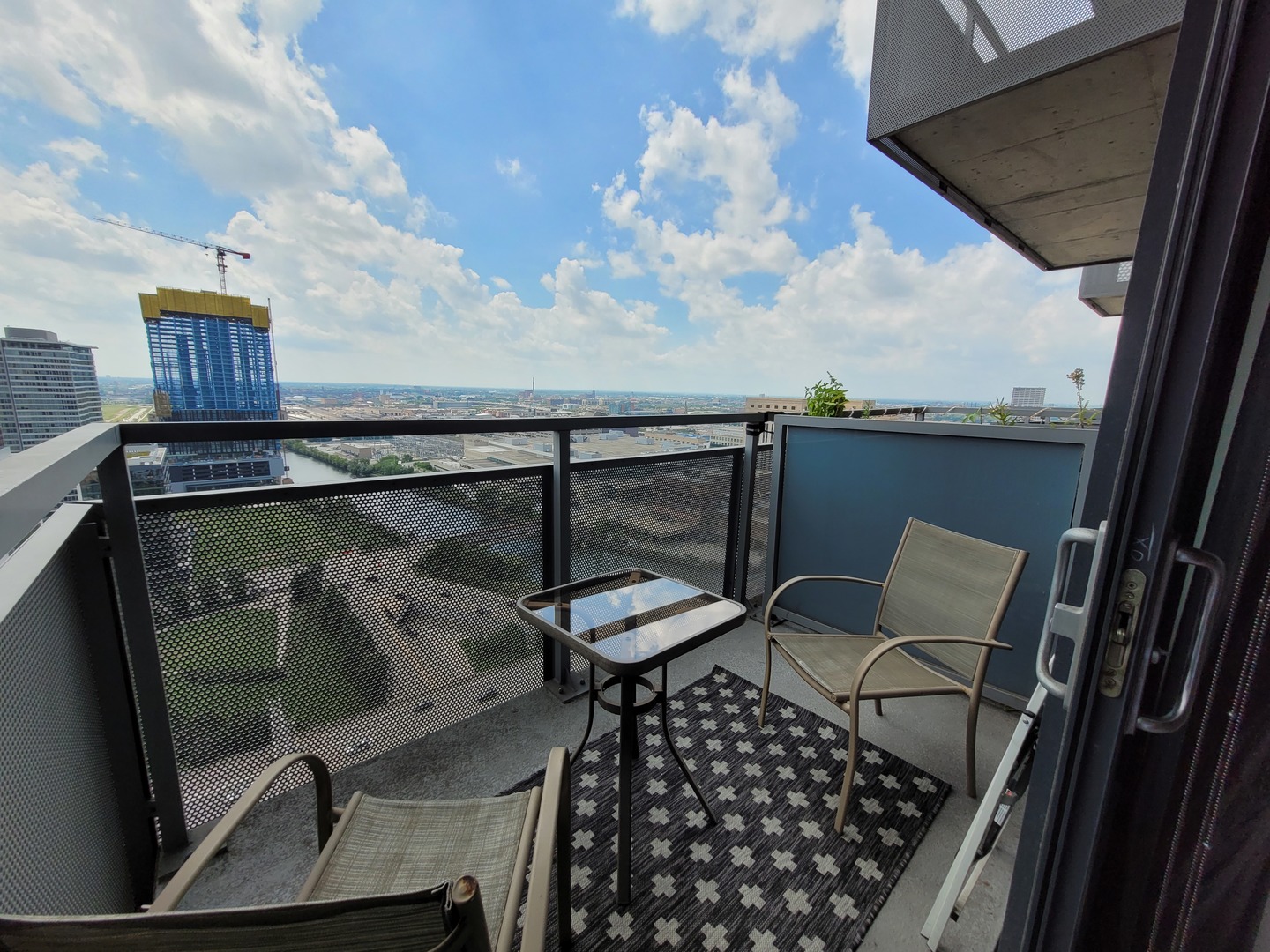 235 West Van Buren Street, Unit 2608 Chicago, IL 60607 - Photo 18 of 20 a view of balcony with furniture