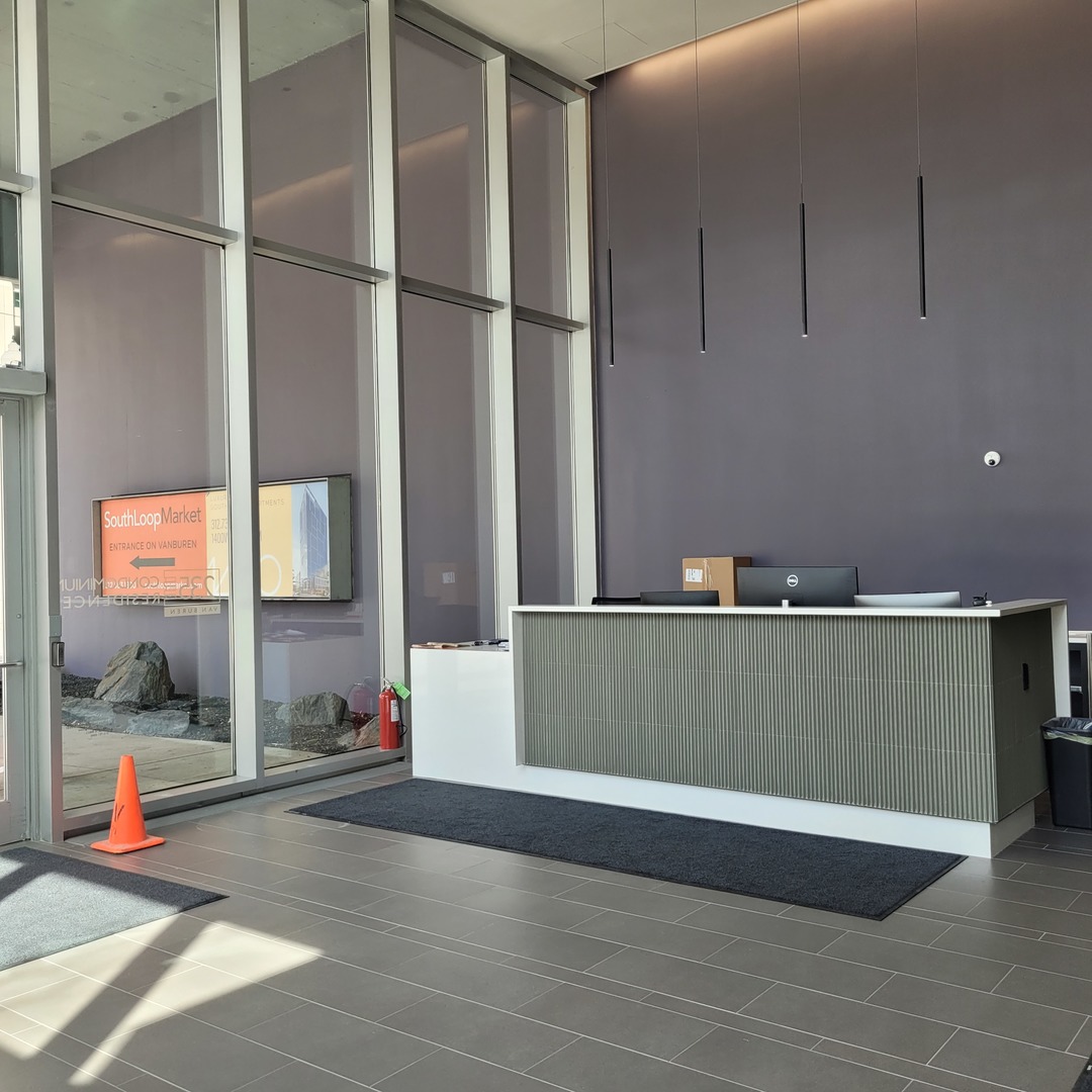 235 West Van Buren Street, Unit 2608 Chicago, IL 60607 - Photo 2 of 20 a view of entryway and hall with wooden floor