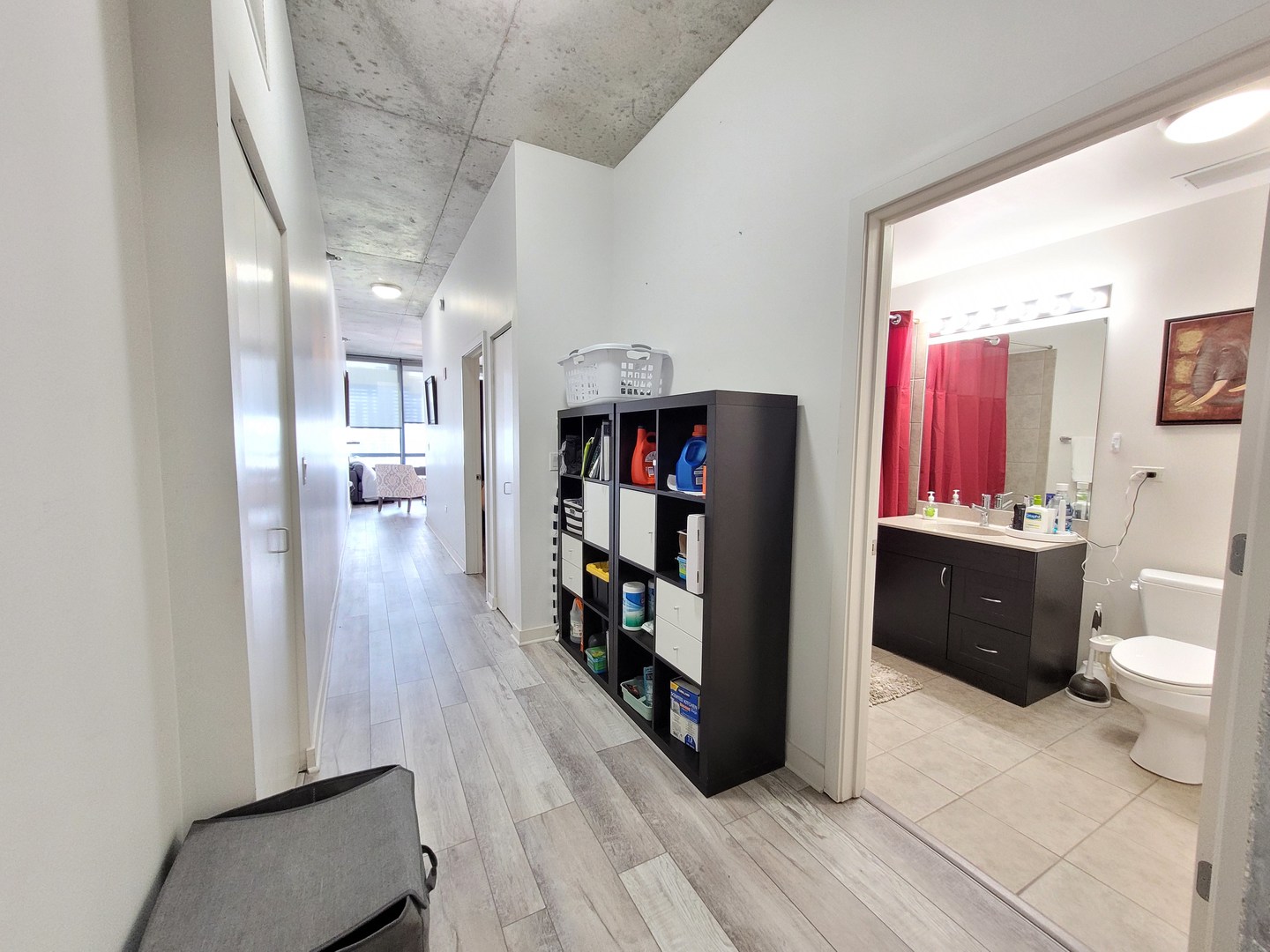 235 West Van Buren Street, Unit 2608 Chicago, IL 60607 - Photo 10 of 20 a spacious bathroom with a double vanity sink toilet and shower