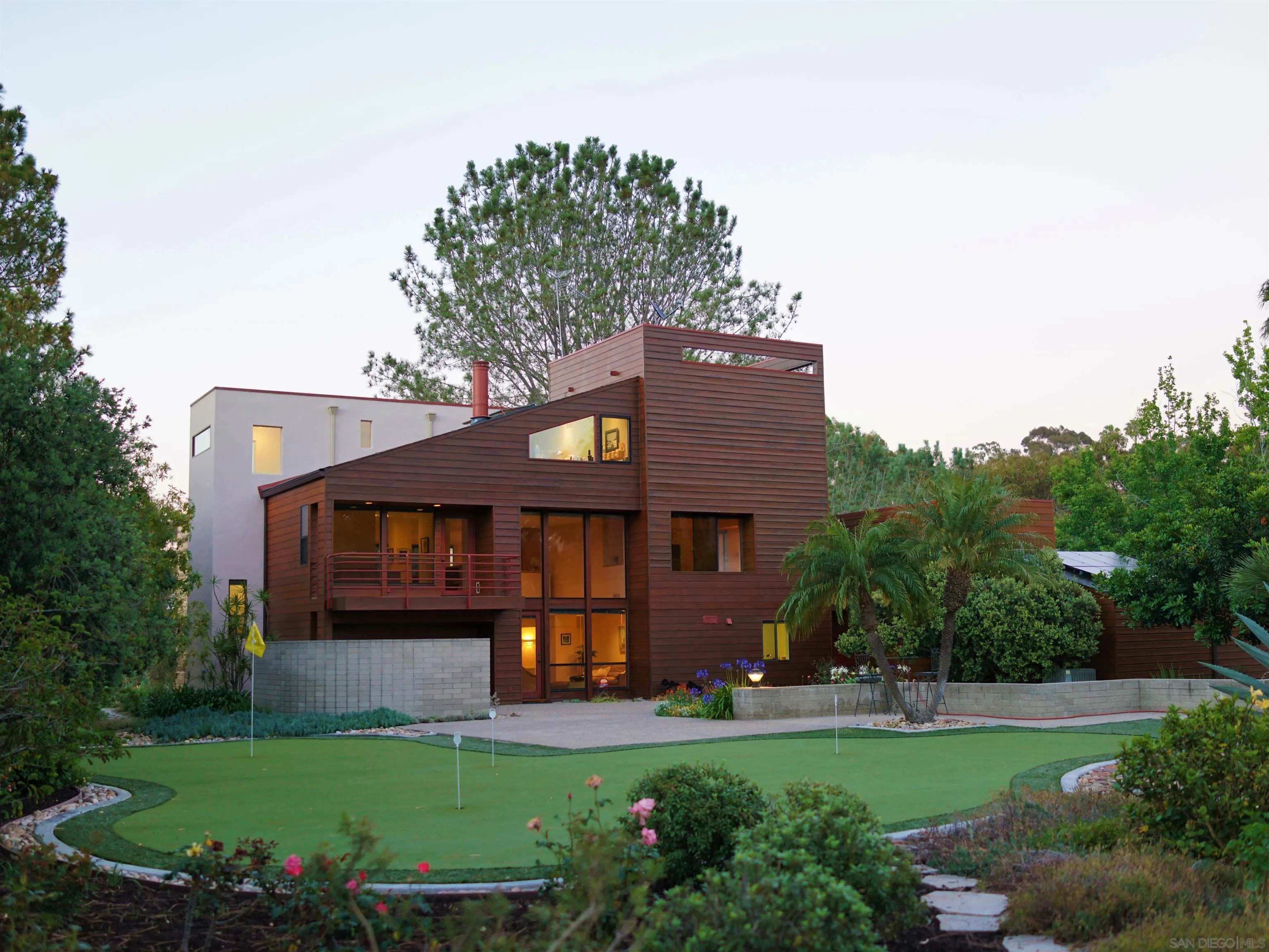 14430 Rancho Santa Fe Farms Road Rancho Santa Fe, CA 92067 - Photo 1 of 51 a front view of a house with garden