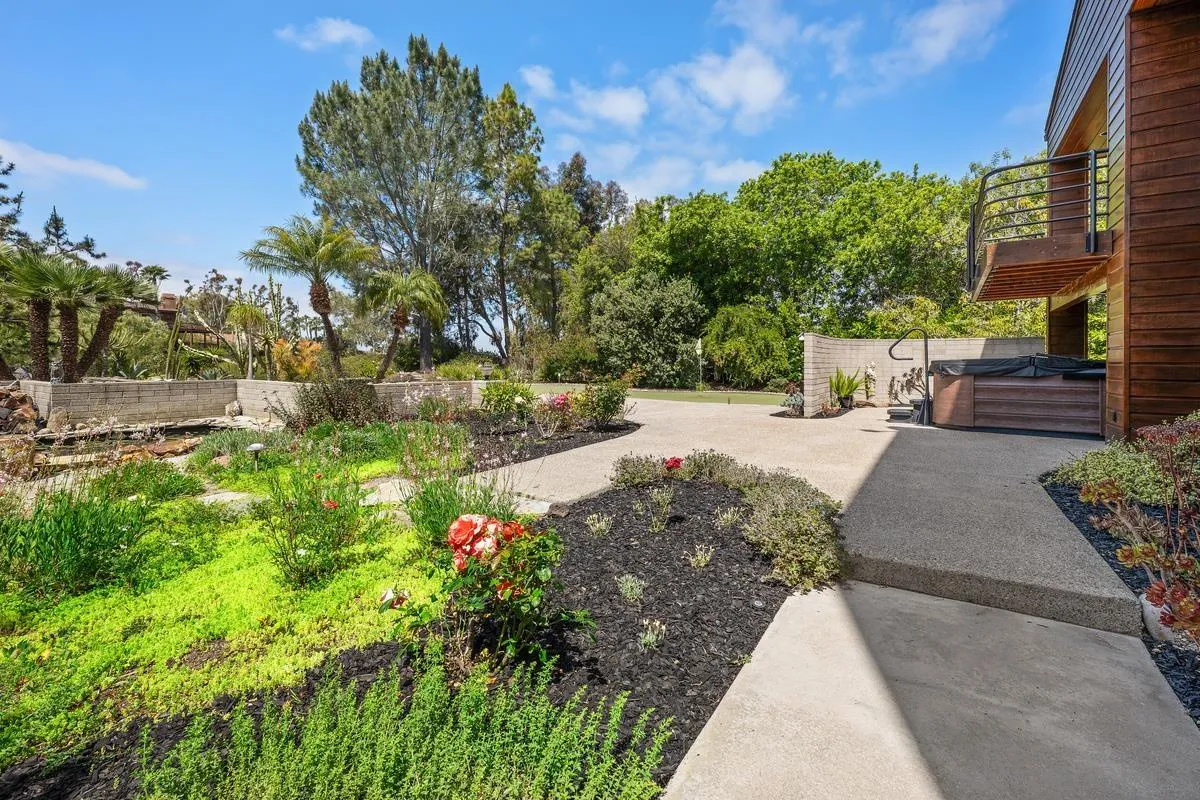 14430 Rancho Santa Fe Farms Road Rancho Santa Fe, CA 92067 - Photo 46 of 51 a view of a pathway with a yard