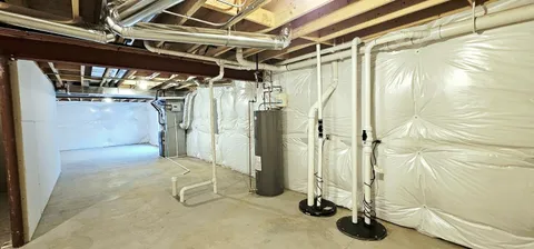 a view of a room with wooden walls