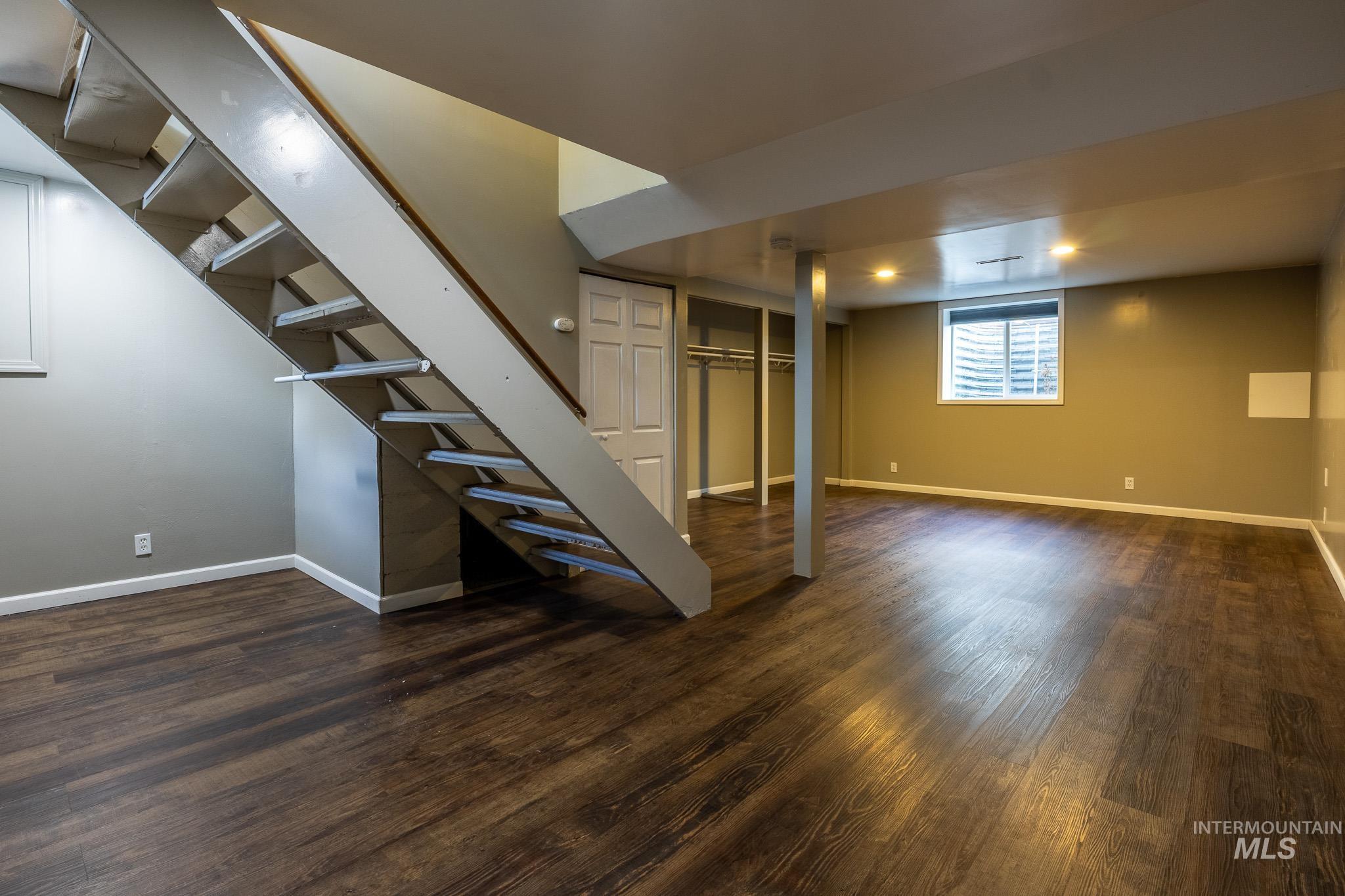 3228 5th Street Lewiston, ID 83501 - Photo 20 of 24 Below grade area with stairway and dark wood-type flooring
