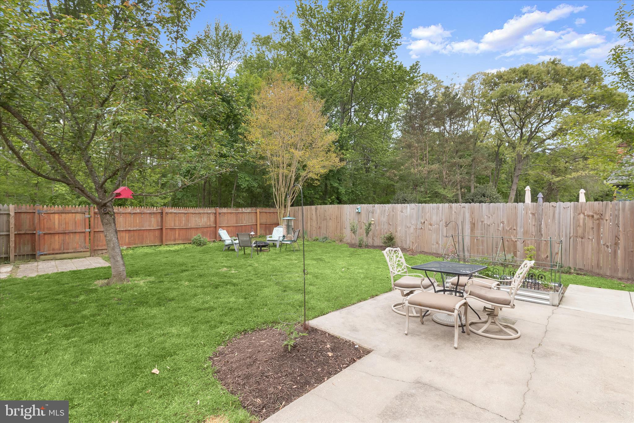 792 Match Point Drive Arnold, MD 21012 - Photo 24 of 43 a view of a backyard with a sitting area and a garden