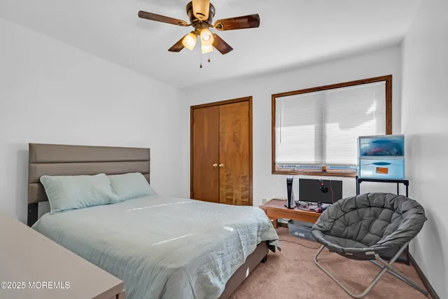 a bathroom with a sink a mirror and a shower