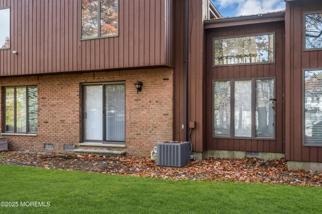 a huge green field with lots of trees