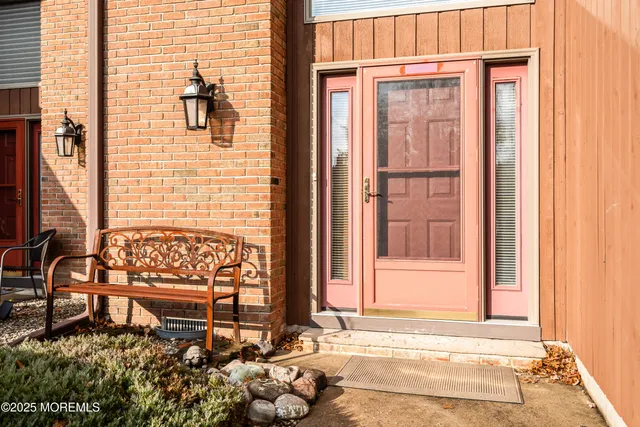 a view of a door and chair and door