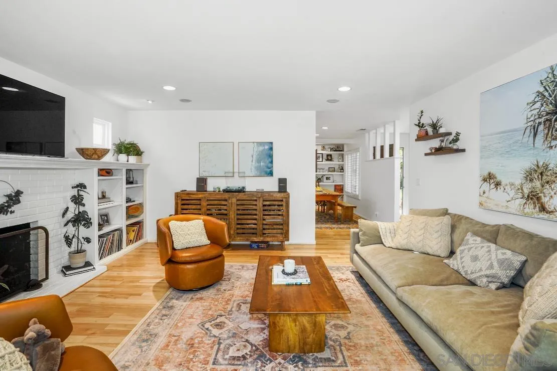 1161 Balour Drive Encinitas, CA 92024 - Photo 16 of 48 a living room with furniture and a flat screen tv