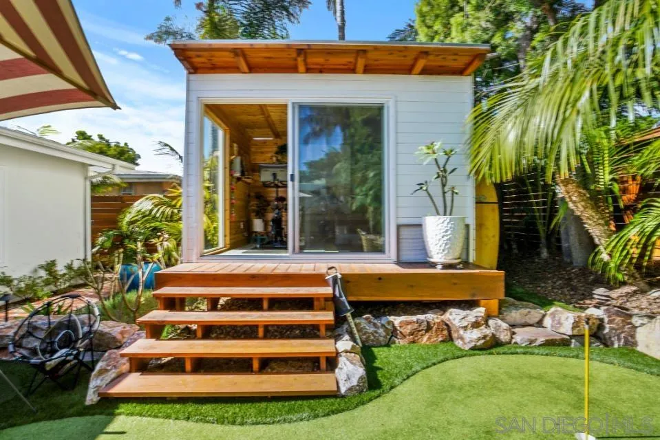 1161 Balour Drive Encinitas, CA 92024 - Photo 30 of 48 a front view of a house with a yard