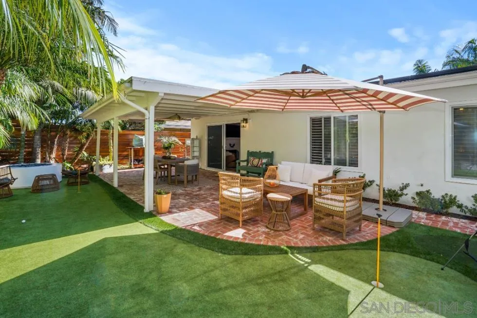 1161 Balour Drive Encinitas, CA 92024 - Photo 33 of 48 a view of a house with backyard porch and sitting area