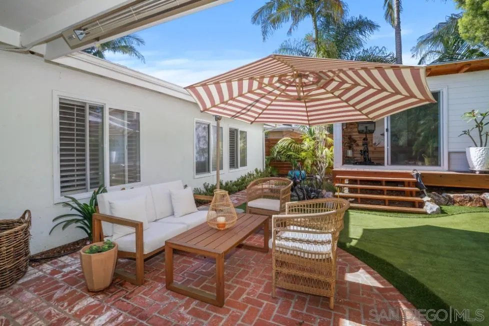 1161 Balour Drive Encinitas, CA 92024 - Photo 35 of 48 a view of a patio with table and chairs and potted plants