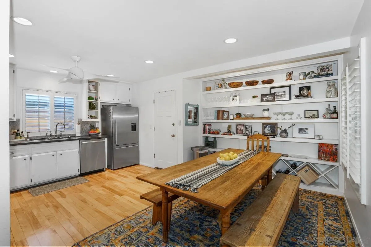 1161 Balour Drive Encinitas, CA 92024 - Photo 9 of 48 a kitchen with refrigerator and chairs