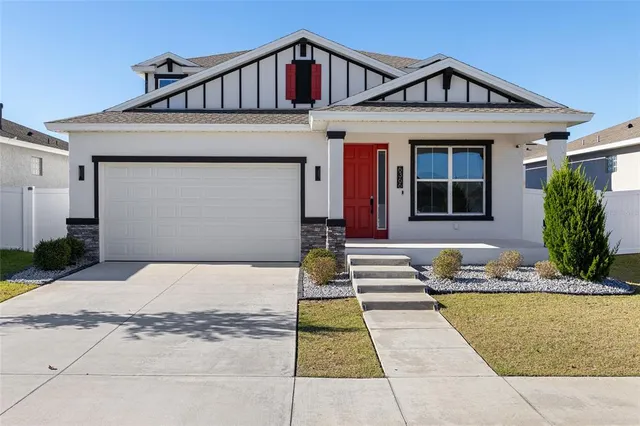 a front view of a house with yard