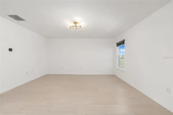 a bathroom with a double vanity sink toilet and mirror