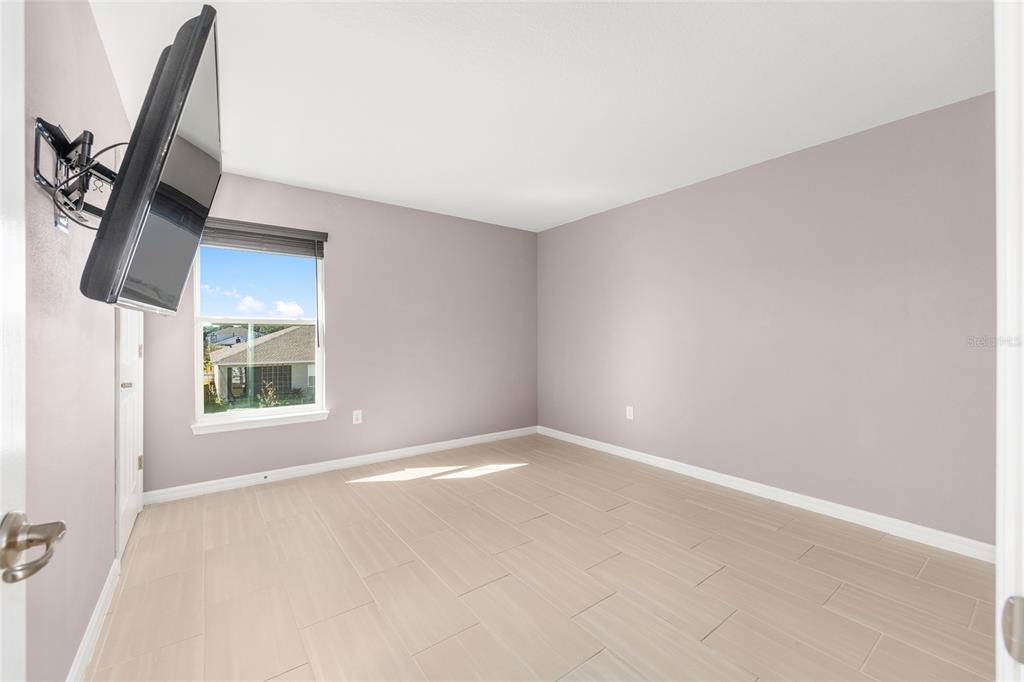 6366 Southwest 77th Avenue Ocala, FL 34474 - Photo 18 of 65 an empty room with windows