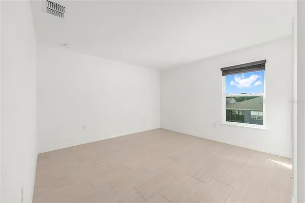 a bathroom with a double vanity sink a mirror and a shower