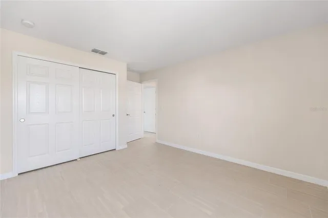 a living room with kitchen island granite countertop furniture and a fireplace