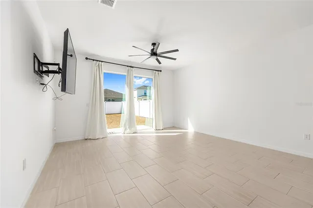 an empty room with window