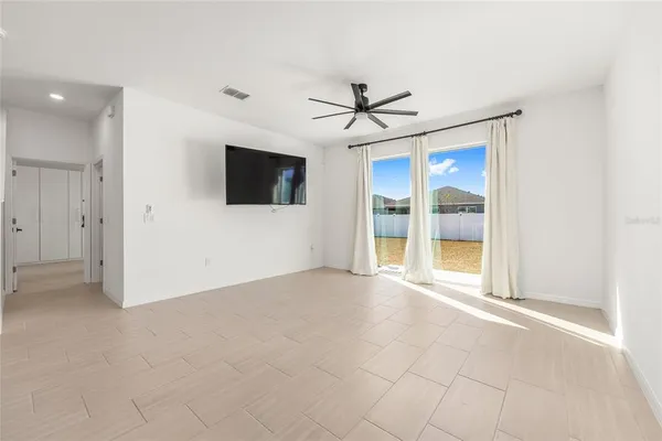 a view of storage and utility room with washer and dryer