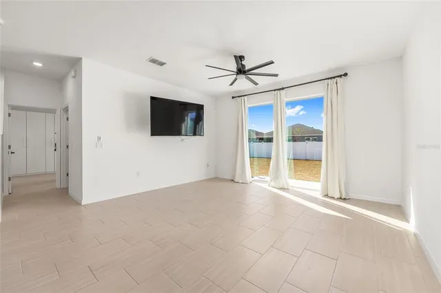 a view of storage and utility room with washer and dryer