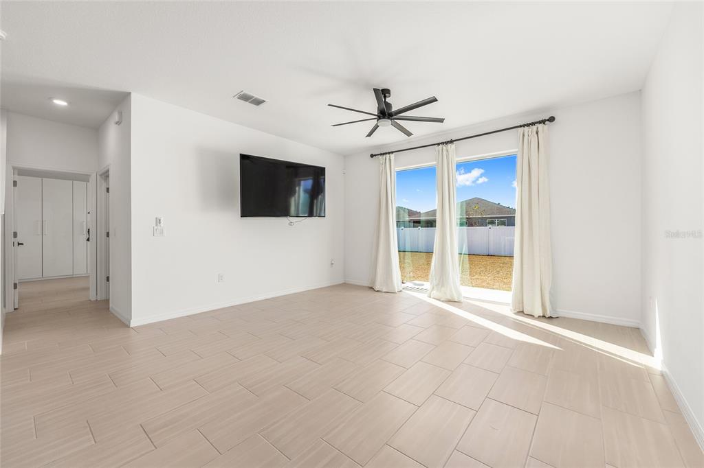 6366 Southwest 77th Avenue Ocala, FL 34474 - Photo 36 of 65 a view of a livingroom with a flat screen tv