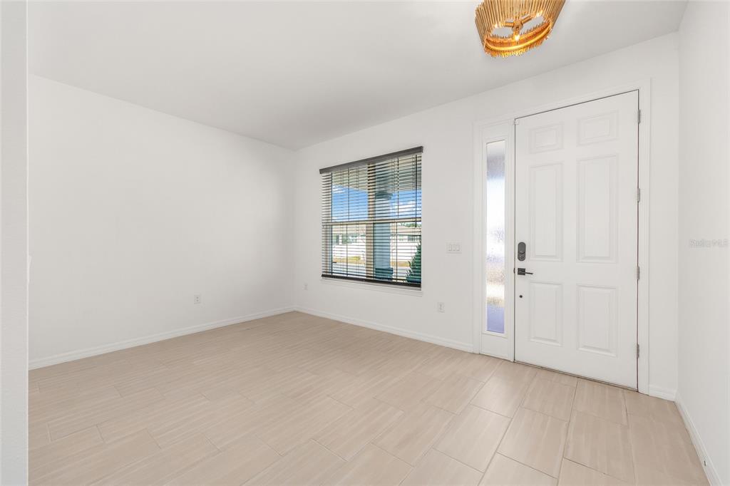 6366 Southwest 77th Avenue Ocala, FL 34474 - Photo 49 of 65 an empty room with windows