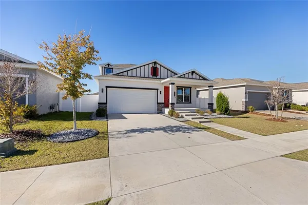 a front view of a house with entertaining space