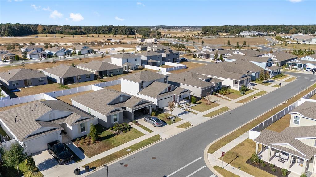 6366 Southwest 77th Avenue Ocala, FL 34474 - Photo 52 of 65 an aerial view of a city with lots of residential buildings