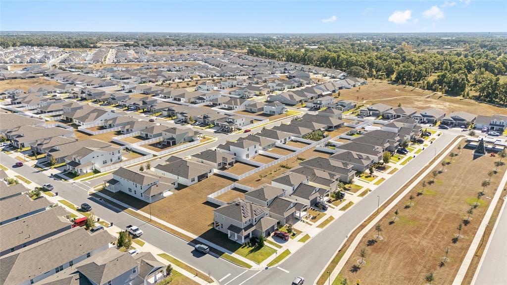 6366 Southwest 77th Avenue Ocala, FL 34474 - Photo 64 of 65 an aerial view of a residential apartment building with a yard