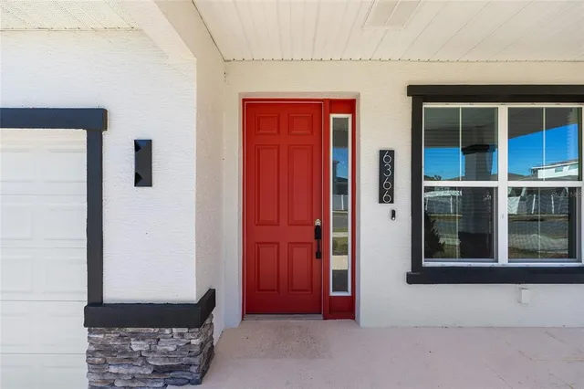 a very nice looking building with a big yard